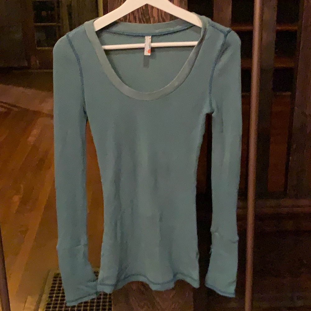 Free people top with details at the wrist